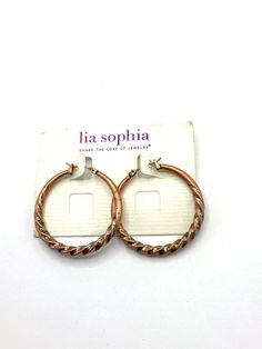 Gorgeous collectible copper round earring by Lia Sophia. Pierced Copper Hoop Earrings, Vintage Bronze Hoop Earrings, Vintage Rose Gold Round Earrings, Brown Metal Hoop Earrings, Rose Gold Round Earrings With Ear Wire, Bronze Round Hoop Earrings For Gift, Bronze Round Earrings, Gold Circle Copper Earrings, Bronze Copper Round Earrings