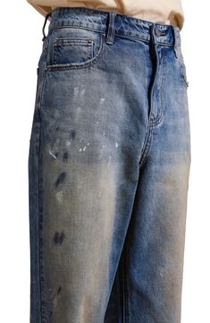 Nicked edges, grungy fading and random smears of paint bring instant history to jeans that are cut from cotton denim and sized to fit like a pair of well-loved favorites. 30" inseam; 18" leg opening; 13" front rise; 15 1/2" back rise (size 32) Zip fly with button closure Five-pocket style 100% cotton Machine wash, tumble dry Imported Distressed Jeans, Nordstrom, Paint, Bring It On, History