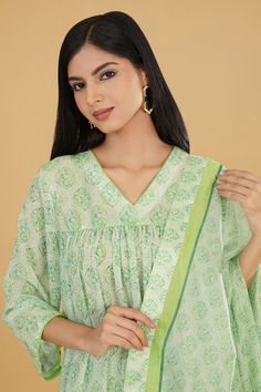 Lime green floral butti print gathered kurta with sequin work and gather detailing. Paired with a printed pant and dupatta. - Aza Fashions Green Anarkali Set With Sheer Dupatta For Summer, Summer Green Anarkali Set With Sheer Dupatta, Green Anarkali Set For Summer Festive Occasion, Green Anarkali Set For Summer Festivities, Summer Festive Green Anarkali Set, Green Cotton Sharara With Sheer Dupatta, Green Sharara With Traditional Drape For Summer, Green Traditional Drape Sharara For Summer, Green Chanderi Anarkali Set With Printed Motifs