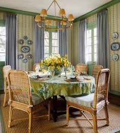 the dining room is decorated in green and yellow