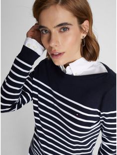 Tommy Hilfiger women's sweater. Made from a premium cotton blend in a flattering, easy fit, our stripe sweater is a soft, comfortable layer. This version is styled in a clean, boatneck silhouette with our microflag at the chest.  Material: 67% Cotton 33% Nylon. Spring Sweater With Horizontal Stripe Pattern, Classic Striped Sweater For Spring, Classic Striped Tops With Ribbed Cuffs, Striped Sweater For Work, Classic Fall Tops With Horizontal Stripe Pattern, Classic Horizontal Stripe Tops For Fall, Classic Fall Tops With Horizontal Stripes, Classic Tommy Hilfiger Striped Tops, Tommy Hilfiger Store