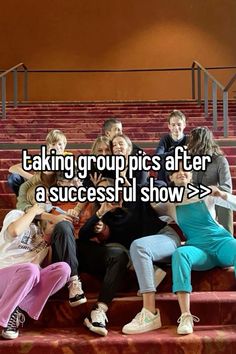 people sitting on steps with the words taking group pics after a successful show >