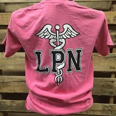 a pink shirt with the word lpn printed on it