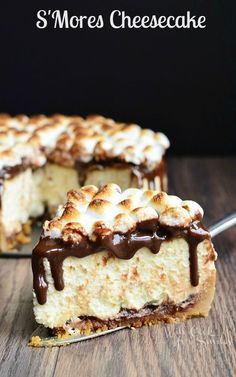 a piece of cake with marshmallows and chocolate drizzled on top