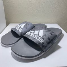 Questions? Leave A Comment Below! Purchase With Confidence Condition:Brand New Size : Men 12 Shipping: Shipping Same Day Shipping If Item Is Purchased Before 3pm Message :If You Have Any Questions About The Item Please Contact Us Adidas Non-slip Synthetic Sport Sandals, Adidas Sporty Flat Slides, Sporty Flat Adidas Slides, Adidas Synthetic Slip-on Slides, Adidas Casual Beach Sport Sandals, Adidas Casual Sport Sandals For Beach, Casual Adidas Sport Sandals For Beach, Gray Synthetic Sport Sandals For Summer, Adidas Non-slip Flat Slides