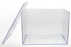 an empty clear box with a long handle on the top and bottom, sitting in front of a white background