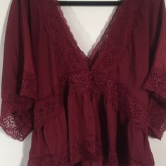 This Burgundy Silk Button Top Fits Deliciously And Has A Sexy Flare. It Is Trimmed With Lace And Sits Perfectly On Any Chest Size. You Can Wear It Open Or As A Top. It Is Brand New And Has Never Been Worn. Forever 21 V-neck Blouse For Night Out, Forever 21 V-neck Blouse For Date Night, Burgundy V-neck Top For Date Night, Forever 21 Tops For Date Night, Blue Peplum Top, White Boho Tops, Simple Tank Tops, Blue And White Shirt, Black Sheer Top