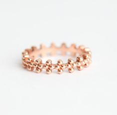 Simple beaded crown ring in 14k ROSE gold in size 5.75 ready to ship. This ring is designed for those who love simplicity with a slight of twist. This ring is perfect as a simple wedding band for her. Ring on the picture is polished. Also matte style is possible. If you would like to have matte band please leave a note at the checkout. Gemstones can be set in this band. Please contact me for pricing. Sizes available: 3.5-8 (Larger and smaller sizes are available. Priced upon request) Please note Boho Wedding Bands, Simple Ring Band, Hammered Wedding Rings, Simple Wedding Band, White Gold Diamond Band, Beaded Crown, Ring Rosegold, Gold Diamond Band, Rose Gold Beads