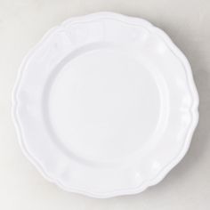 a white plate sitting on top of a table