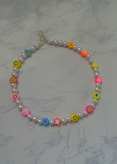 Cute very colorful bead necklace with random colorful beads. Perfect for any occasion or outfit! Perfect birthday gift or for yourself! Adjustable chain and custom sizing. Collares Aesthetic, Bead Business, Preppy Necklaces, Bracelet Inspo, Faux Pearl Bracelet, Bracelet Shop, Diy Bracelet Designs, Phone Charms, Pearl Choker Necklace