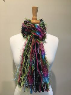 "Tutti Frutti is a bright and vibrant scarf in a beautiful mix of colors. You can't go wrong putting black, light blue, fuschia and lime green together! ★・゜゜・★ HOME OF THE ORIGINAL ALL FRINGE KNOTTED SCARF ★・゜゜・★ These scarves make great gifts for Valentine's Day, Mother's Day, Birthdays, Christmas, Anniversaries and those Just Because occasions. (Please Note-Buy with ease-Any scarves purchased may be exchanged at no additional charge). Don't forget to get one or two for yourself.  '*.'*.¸MULTIP Multicolor Bohemian Scarves For Party, Bohemian Multicolor Party Scarves, Multicolor Party Scarf One Size, Multicolor Bohemian Party Scarves, Yarn Scarf, Necklace Scarf, Scarf Knots, Womens Scarf, Scarf Yarn