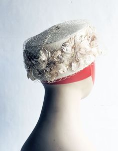 Vintage Champagne  floral pillbox hat with netting. Good vintage condition, may show some minor sign of normal wear. Color: Champagne/ beige Size: One Size  Interior cir.:21"-22 Condition: Good vintage IMPORTANT: Colors vary from computer to computer, so read the description carefully! Don't buy based on pictures alone! Take your own measurements to ensure clothing and shoe fit. Payments DVP accepts PayPal, credit and debit cards through Direct Check-out. All payments are expected upon purchase, unless you've contacted me beforehand and an agreement for payment has been made. I will happily reserve any item for an agreed upon time. RETURNS & EXCHANGES I don't accept returns on vintage items But please contact me if you have any problems with your order. Returns and exchange details Buyer i Vintage Beige Fascinator With Curved Brim, Vintage Beige Visor Hat, Vintage Cream Fascinator With Short Brim, Vintage Beige Fascinator For Evening, Cream Brimmed Vintage Fascinator, Beige Vintage Fascinator With Short Brim, Vintage Beige Short Brim Fascinator, Beige Vintage Short Brim Fascinator, Vintage Cream Fascinator Hat