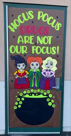 Classroom door inspired by Hocus Pocus. The Sanderson sisters stand over a brewing cauldron with bubbles spilling over the sides, each bubble containing a child name. At the very top it reads “Hocus Pocus drugs are not our focus” with small potion bottles scattered all around. Fall Red Ribbon Week Door, Red Ribbon Week Doors Ideas, Door Decorations Classroom Halloween Red Ribbon Week, Red Ribbon Classroom Door Ideas, Halloween Library Door Decorations, Movie Themed Red Ribbon Week, Hocus Pocus School Door, Door Decorating Contest Red Ribbon Week, Halloween Door Decorations Hocus Pocus