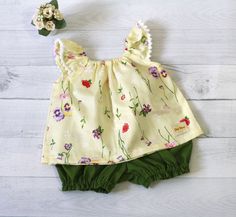 Baby Girl Clothes, Spring Floral top with green bloomer, by DearMimiDress on Etsy https://www.etsy.com/listing/239224466/baby-girl-clothes-spring-floral-top-with Cute Cotton Bloomers For Spring, Cute Cotton Bloomers With Floral Print, Cute Floral Print Cotton Bloomers, Cute Yellow Cotton Sets, Green Playful Sets For Spring, Playful Green Sets For Spring, Playful Green Spring Sets, Spring Cotton Bloomers With Floral Print, Playful Cream Cotton Sets