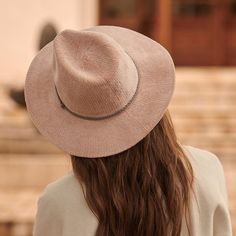 The EMES SHOP hat is detailed with minimalist slim braid trim. Features a woven material. small metallic tag detail. and fedora hat design.MATERIAL:100% Brushed Wool BlendCIRCUMFERENCE MEASUREMENTS: 56-58cm 22-23in Chic Braided Hat With Flat Brim, Elegant Braided Hat With Curved Brim, Braided Flat Brim Fedora, Skeleton Hat, Wide Brim Bucket Hat, Woven Hat, Womens Fedora, Bucket Hat Women, Trilby Hat