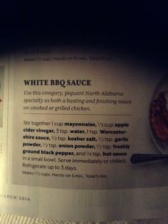 the menu for white bbq sauce is displayed in a restaurant