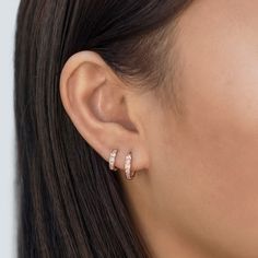 These Rose Gold Vermeil Huggie Hoop earrings will be your favorite everyday pairs. Our Huggies are true to size and will hug your ear perfectly. Great for smaller lobes or second piercings. 14K Rose Gold over Sterling Silver Cubic Zirconia Crystals Hypoallergenic, lead and nickel free Thickness 2mm Inside Diameter Sizes: 6.5mm, 9mm Snap closure #E008-RG Rose Gold Huggie Cartilage Earrings For Anniversary, Dainty Rose Gold Tarnish-resistant Huggie Earrings, Anniversary Rose Gold Huggie Cartilage Earrings, Minimalist Rose Gold Huggie Earrings, Rose Gold Tarnish-resistant Dainty Huggie Earrings, Rose Gold Tarnish Resistant Huggie Earrings, Rose Gold Sterling Silver Huggie Earrings, Delicate Rose Gold Small Hoop Huggie Earrings, Delicate Rose Gold Huggie Earrings