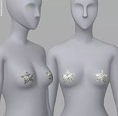 two white mannequins with silver sequins on their backs and sides