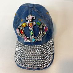 This Hat Is Meant For The Queen In You... And Your Not Afraid To Flaunt It! All The Stones Are In Tack And This Cap Is In Euc This Would Also Make A Great Gf Gift. This Hat Could Be A Cutom Piece Spring Blue Denim Baseball Cap, Denim Snapback Baseball Cap For Spring, Blue Denim Visor Hat, Trendy Denim Snapback Baseball Cap, Denim Visor Hat, One Size Fits Most, Denim Visor Hat One Size, Denim Visor Hat One Size Fits Most, Denim Visor Hat, Trendy Blue Denim Baseball Cap