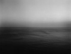 a black and white photo of the ocean