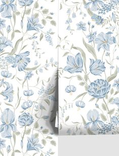 the wall paper has blue flowers on it