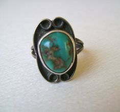 Antique Turquoise Ring With Patina, Vintage Turquoise Ring With Large Oval Stone, Vintage Oval Turquoise Ring With Large Stone, Vintage Handmade Oval Turquoise Ring, Handmade Vintage Oval Turquoise Ring, Handmade Vintage Turquoise Oval Ring, Vintage Turquoise Ring With Patina For Gift, Rustic Adjustable Turquoise Ring, Adjustable Rustic Turquoise Ring