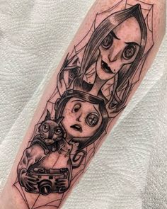 a black and white tattoo with an image of two people