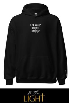 image of a black hoodie with "Let Your Light Shine" embroidered in white on the front center chest. The wrist is also embroidered with "Matthew 5:16" Christian Clothing Men, Boutique Website, Christian Sweatshirts, Faith Messages, Christian Apparel Men, Christian Clothing Brand, Christian Designs, Christian Sweatshirt, Let Your Light Shine