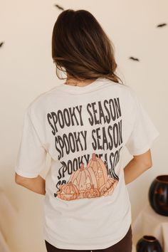 Embrace the spooky season with our Ivory Spooky Pumpkin Graphic Tee! Perfect for Halloween, this cute and playful graphic tee features pumpkins for fall fun. A must-have for any seasonal wardrobe. Paired with JBD UTILITY PANTS IN COFFEE Round neck Short sleeves Pumpkin and "Spooky Season" graphic 100% cotton Runs true to size. Small (0-2), Medium (4-6), Large (8-10), X-Large (12-14), XX-Large (16-18). Model is 5'1" and wearing a small. Check out our try-on video below! Happy Threads, Summer Goddess, Pumpkin Graphic, Pink Desert, Seasonal Wardrobe, Exclusive Clothing, Spooky Pumpkin, Nursing Friendly, Utility Pants