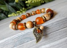 Autumn Bracelet with a Leaf Charm and Natural Stone Beads Autumn Bracelet, Earthy Jewelry, Orange Bracelet, Natural Stone Beads, Natural Stone Bracelets, Fall Jewelry, Handmade Charms, Leaf Charms, I Love Jewelry