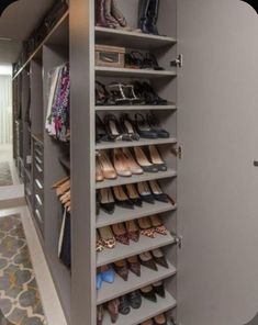 an organized closet with lots of shoes