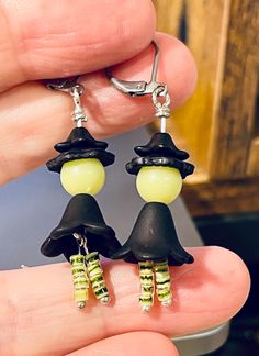 Super cute Witch dangle earrings. Striped stockings and black dress with black hat. So cute and light. Perfect for Halloween! Fun Black Halloween Jewelry, Fun Black Jewelry For Halloween, Spooky Black Earrings For Party, Cute Black Jewelry For Party, Fun Black Earrings, Novelty Black Earrings For Party, Novelty Black Party Earrings, Fun Handmade Black Earrings, Handmade Fun Black Earrings