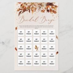 the bridal bingo game is shown with gold leaves and flowers on white marble background