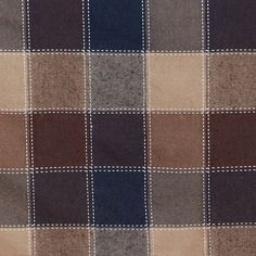 a brown and blue checkered fabric with white stitchs