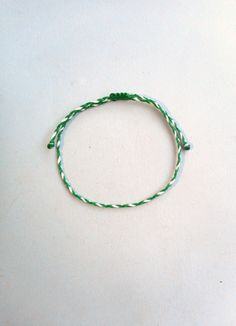 Braided bracelet,Waxed cord bracelet , Unisex, Water proof string, Surfer aesthetic, Adjustable bracelet Mens bracelet Gift for him This simple yet beautifull bracelet is made using durable waxed string. It is adjustable with a sliding knot closure. Other evil eye bracelets from my shop: https://www.etsy.com/shop/LuckyRatJewellery?section_id=14785936&ref=shopsection_leftnav_5 Other charm bracelets in my shop: https://www.etsy.com/shop/LuckyRatJewellery?section_id=16685466&ref=shopsection White Braided Nylon Cord Bracelet With Adjustable Length, White Braided Bracelets With Adjustable Length, White Braided Bracelet With Adjustable Length, White Nylon Cord Friendship Bracelets As Gift, White Nylon Cord Friendship Bracelet, White Braided Bracelets With Sliding Knot Nylon Cord, White Nylon Cord Braided Friendship Bracelet, Handmade White Nylon Cord Bracelet, White Waxed Cord Friendship Jewelry