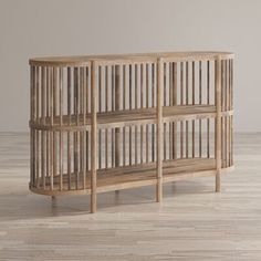 a wooden shelf sitting on top of a hard wood floor