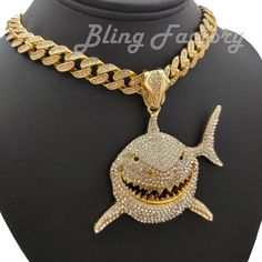 6ix9ine Iced Shark Pendant 16" 18" 20" 24" Full Iced Cuban Chain Bling Necklace HIP HOP CELEBRITY STYLE BRAND NEW USA SELLER Product Description Iced Cuban Chain : Chain Length : 16" 18" 20" 24" Chain Width : 12mm COLOR: 14K Gold Plated Lab Simulated Diamonds Box Lock Pendant : Hip Hop Celebrity Style Pendant & Chain 14K GOLD PLATED SIZE OF PENDANT : 70mm x 60mm High Quality and polished. Payments: US Customers: Paypal accepted International Customers: Paypal accepted Shipping: For Shipping & Handling within the US: FREE We do combine shipping! We ship via USPS (Post office) First Class Mail Tracking Info will automatically be posted via Paypal and ebay. Approximate Delivery Times: US: 2-5 BUSINESS DAYS Canada: 1-2 weeks Europe: 1-6 weeks South America: 2 weeks Australia: 2 weeks Asia: 2 w Shark Pendant, Diamond Box, Bling Necklace, Cuban Chain, Fashion Jewelry Necklaces, Metal Bands, Chain Lengths, Fashion Watches, Jewelry Necklace Pendant