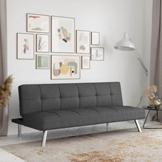 a living room scene with focus on the futon