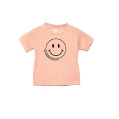 Smiley Face Kids Tee 100% Cotton Trendy Spring Playtime T-shirt, Playful Black T-shirt For Spring, Casual Graphic Print Tops For Playtime, Playful Black Cotton Shirt, Funny Print Tops For Spring Playtime, Basic T-shirt For Summer Playtime, Funny Print T-shirt For Spring Playtime, Casual Letter Print Tops For Playtime, Graphic Tee With Funny Print For Playtime