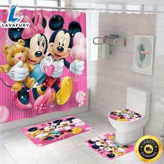 a bathroom with mickey and minnie mouses on the shower curtain, toilet seat cover and rug