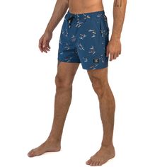 Ride the waves in style with our Caribbean Cove men's shorts. Inspired by the surf culture of the Caribbean, these shorts feature a trendy navy blue color scheme and a surf-inspired design. Perfect for the beach or the boardwalk, our shorts are made with high-quality materials that provide maximum comfort, durability, and flexibility. The elasticated waist and drawstring adjustment ensure a secure and comfortable fit, making them ideal for any activity. Whether you're surfing, swimming, or loung Casual Surfing Shorts, Blue Beachy Shorts For Swimming, Blue Beachy Swim Shorts, Beachy Blue Swimming Shorts, Blue Bermuda Swim Trunks For Beachwear, Beachy Blue Shorts, Blue Bermuda Swimwear For Beachwear, Beachy Shorts For Surfing, Casual Short Length Swimwear For Surfing