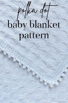 a white blanket with the words polia dot baby blanket pattern in black ink on it