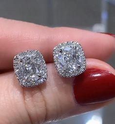 Perfect match, our 2.39-carat diamond stud earrings are timeless and sure to please for everyday wear. Metal: 18K White GoldDiamond Shape: 2 Cushion BrilliantDiamond Weight & Details: 2.06ctw - D Color / VS1 ClarityPave Diamonds: Round Brilliant Cuts 0.33ctwBackings: Push Backs Luxury Moissanite Earrings With Halo Setting, Dazzling Moissanite Diamond Earrings With Halo Design, Dazzling Diamond Earrings With Halo Design, Cushion Cut Halo Setting Earrings, Cushion Cut Diamond Luxury Earrings, Dazzling Moissanite Earrings With Halo Setting, Dazzling Diamond Bridal Earrings With Halo Setting, Diamond Cushion Cut Halo Earrings, Diamond Halo Design Cushion Cut Earrings