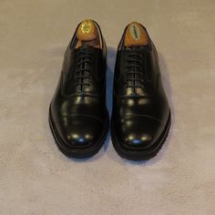 Calf Leather Made In Uk Us Size: 8 Uk Size: 7 Fitting: F Last: 100 Outsole Length: 11.75 Inches Insole Length: 10.375 Inches Outsole Width: 4.125 Inches Fitted Black Leather Cap Toe Shoes, Classic Black Oxfords With Branded Insole, Classic Black Oxfords With Almond Toe, Timeless Black Oxfords With Round Toe, Black Cap Toe Oxfords With Rubber Heel Cap, Classic Black Leather Shoes With Round Toe, Classic Fitted Leather Shoes With Closed Toe, Classic Black Cap Toe Dress Shoes, Classic Fitted Closed Toe Leather Shoes