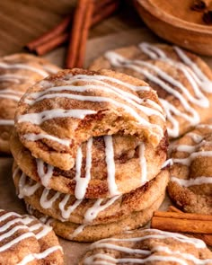 cinnamon sugar cookies with white icing and cinnamon sticks