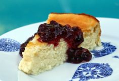 a piece of cake sitting on top of a blue and white plate