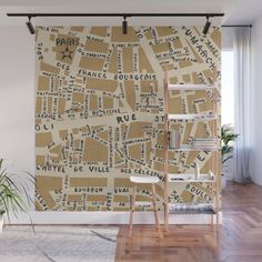 a map of paris in brown and white wallpaper mural print with the names of major streets