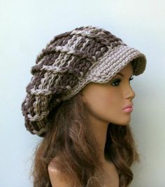 a mannequin head wearing a crocheted hat