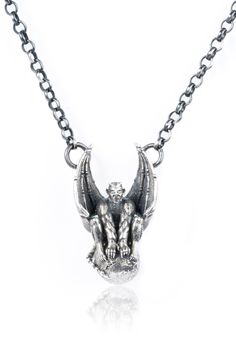 RETRO GARGOYLE GOTHIC 925K Sterling Silver Necklace Introducing our sterling silver gargoyle necklace, a one-of-a-kind, handcrafted piece of jewelry. This necklace features a detailed and intricate pendant of a gargoyle, an ancient symbol of protection, carved from premium sterling silver. The pendant hangs from a  silver chain that is made to fit most neck sizes. This necklace is perfect for those who appreciate unique and meaningful designs and will be a treasured addition to any jewelry colle Symbolic Hand Cast Sterling Silver Necklaces, Symbolic Hand Cast Sterling Silver Necklace, Symbolic Sterling Silver Necklace, Gothic Oxidized Sterling Silver Necklaces, Gothic Sterling Silver Necklace With Oxidized Finish, Gothic Hand Forged Sterling Silver Jewelry, Hand Forged Sterling Silver Gothic Jewelry, Hand Cast Antique Silver Sterling Silver Necklace, Antique Silver Hand Cast Sterling Silver Necklace