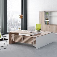 an office with a desk, chair and bookcase in front of a large window